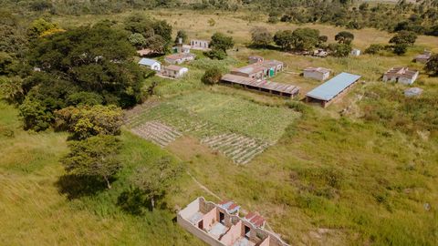 Open grounds and school buildings viewed from above at Chegutu