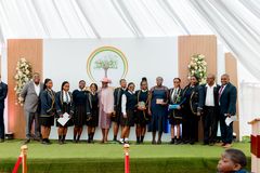 Learners gathered on the branded school stage during prize giving