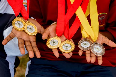 School sports day participants displaying their medals